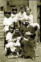 The children of LÈo and Fleur-de-Mai with their aunt Mary Cannon